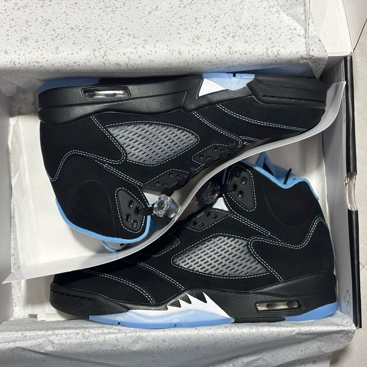 AJ5 retro “black/university blue”